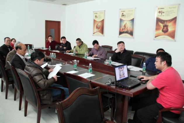 图2、评委会认真审核参评候选优秀专卖店资料.jpg